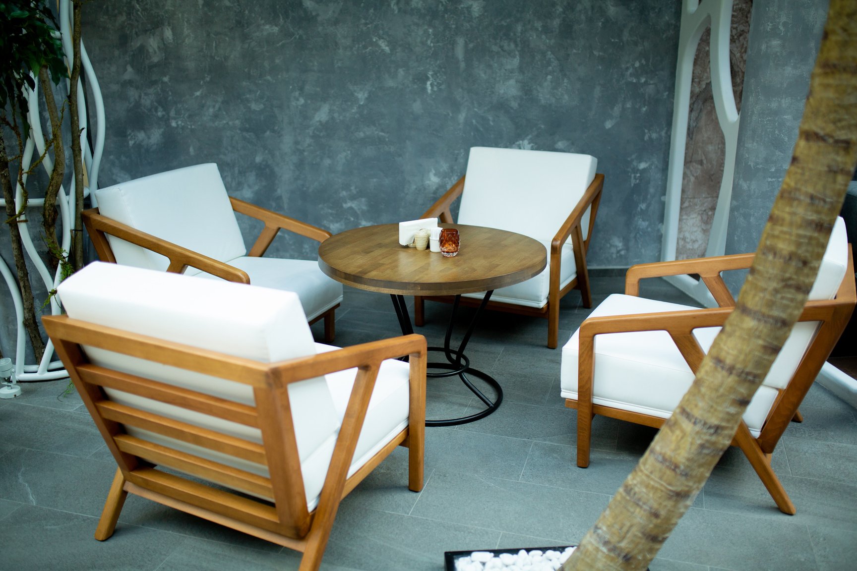 Outdoor Seating Area with Armchairs and Coffee Table